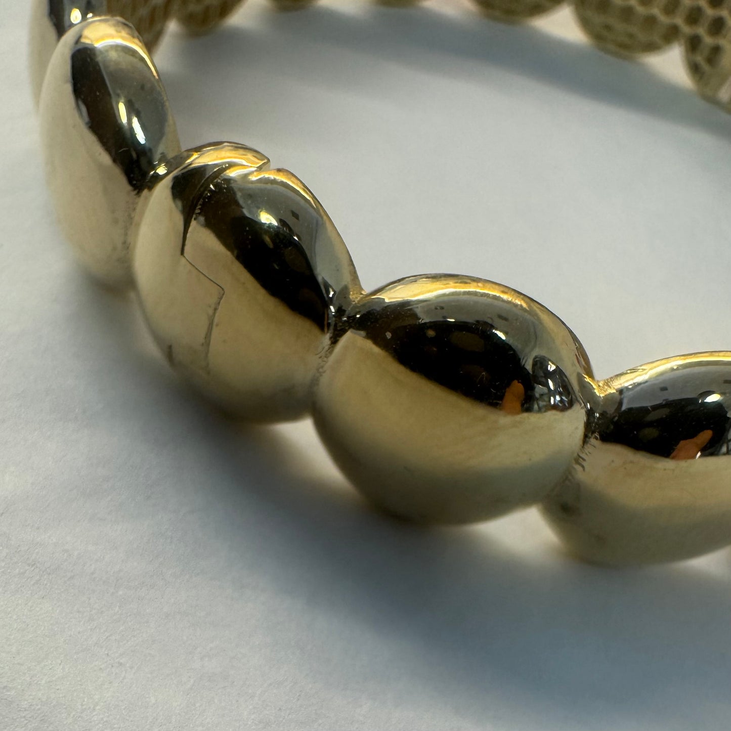 14K gold bracelet set with bold, rounded links