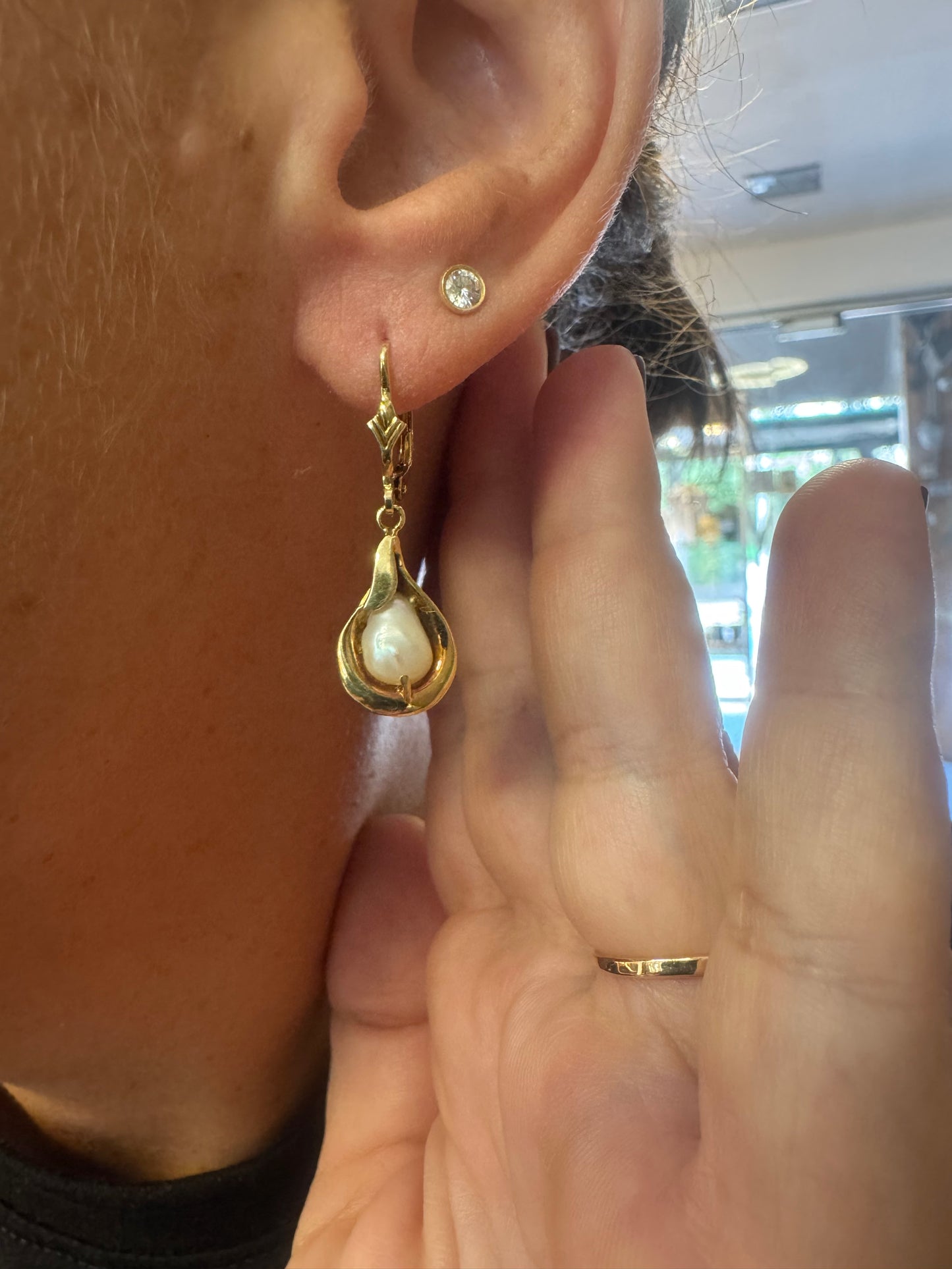 14K gold drop earrings featuring baroque Pearls set in fluid, organic shape