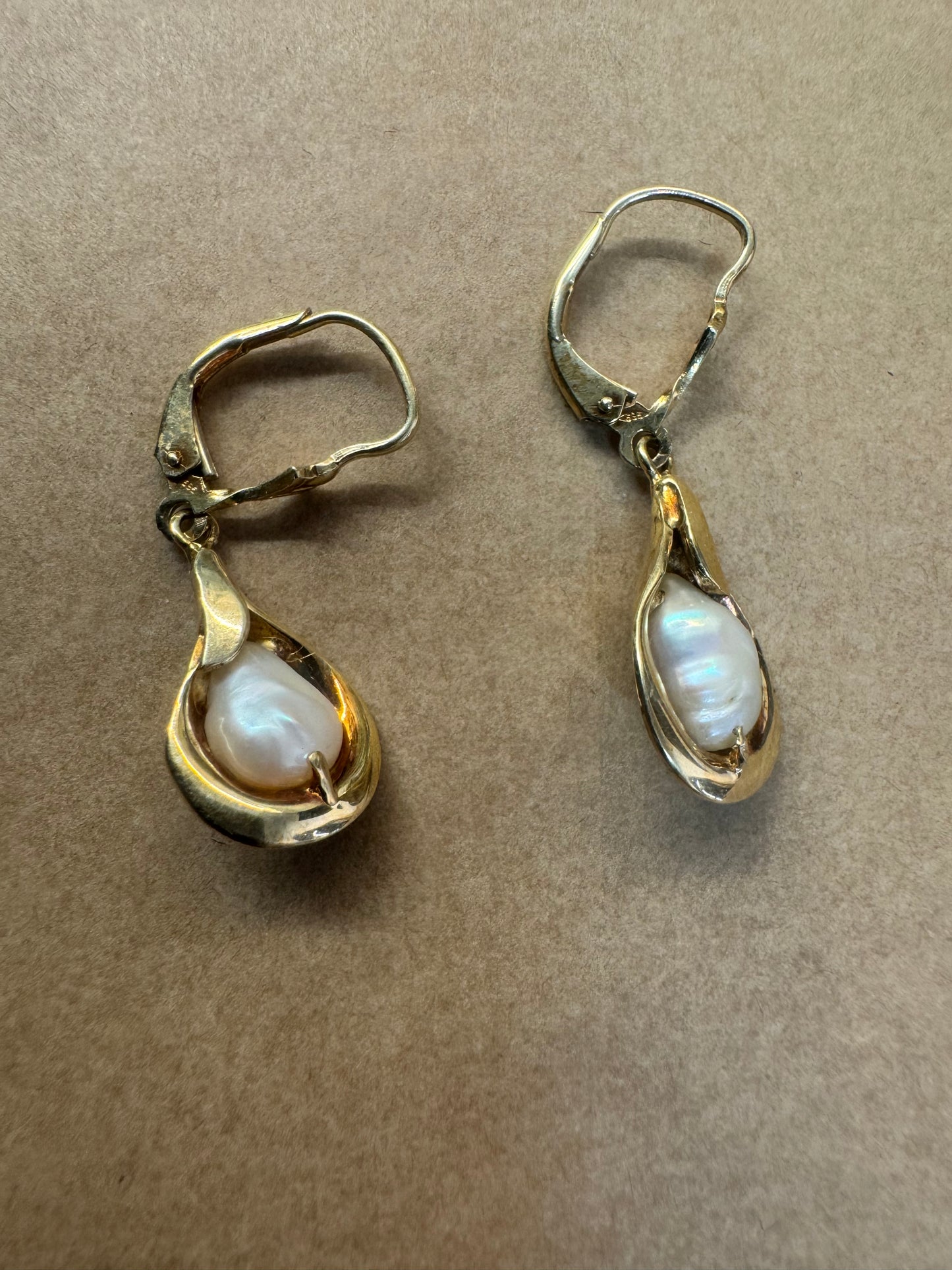 14K gold drop earrings featuring baroque Pearls set in fluid, organic shape