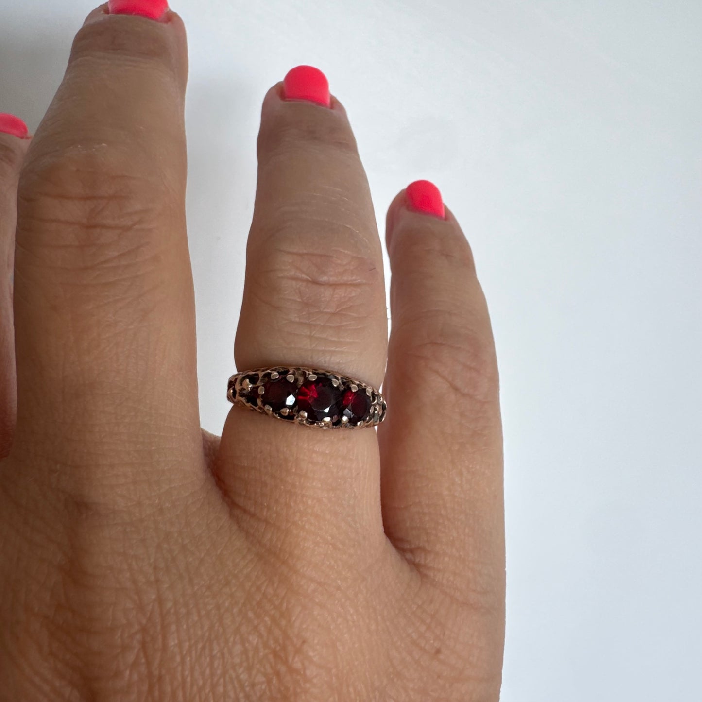 9K gold ring set with deep red Garnet stones