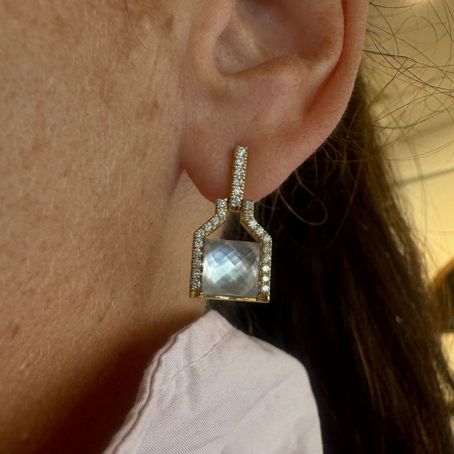 18K gold earrings featuring a cushion-cut translucent Gemstone, framed with sparkling Diamonds