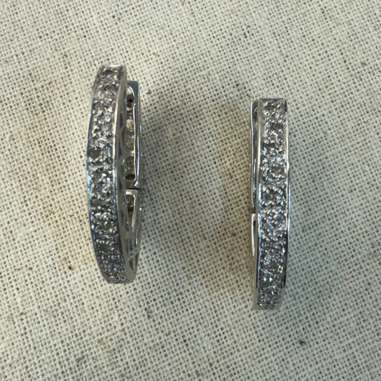 14K gold hoop earrings set with Diamonds