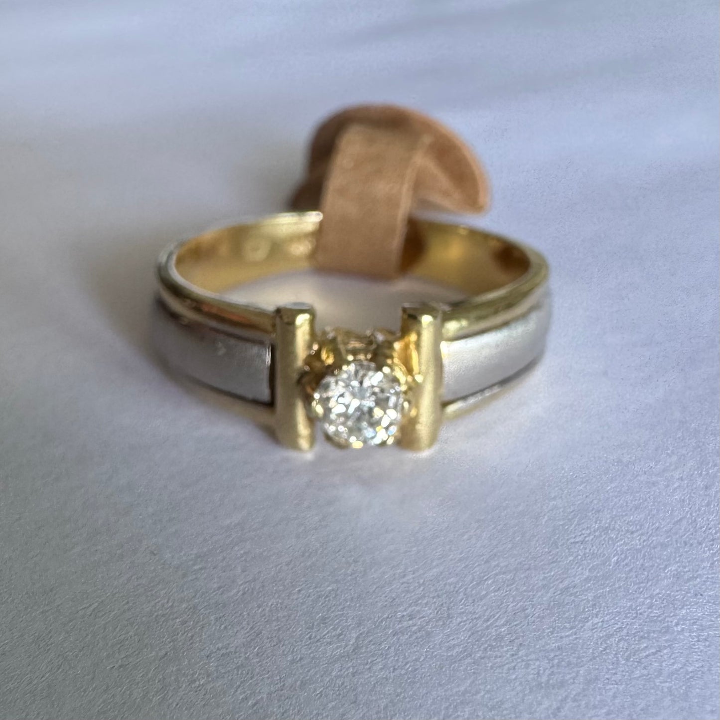 14K two-tone gold ring set with one center Diamond