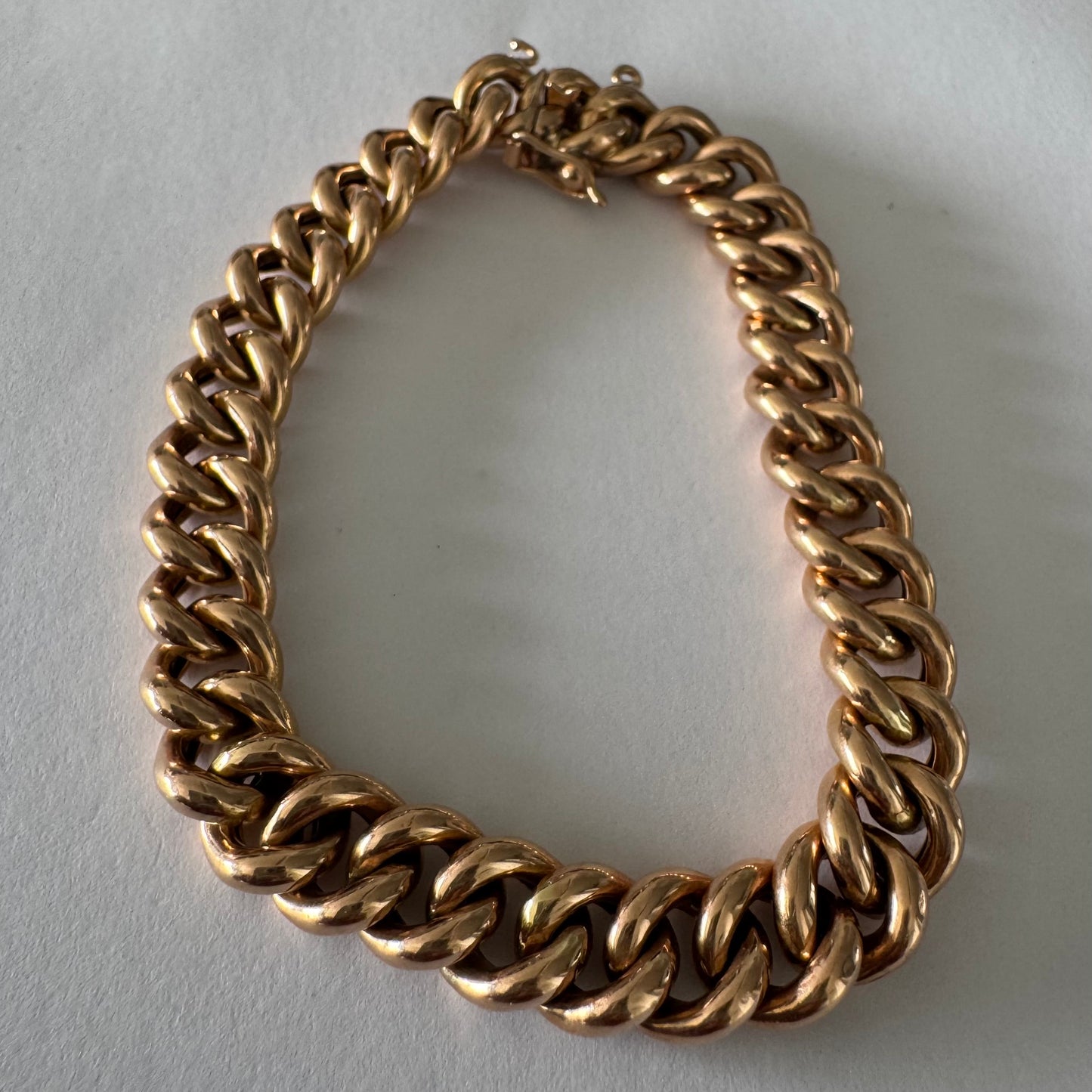 14K gold chain bracelet featuring bold, classic link design.