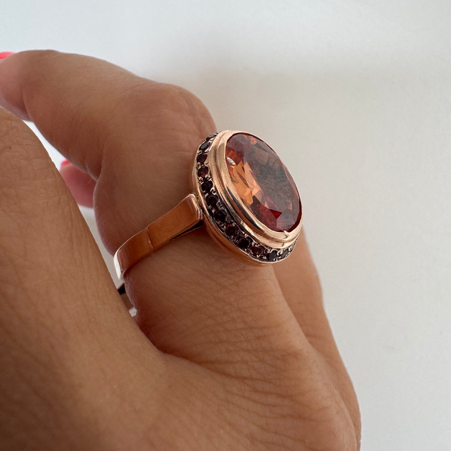 14K gold ring featuring a large cognac-toned Citrine, accented with delicate Ruby stones for a touch of rich color and contrast.
