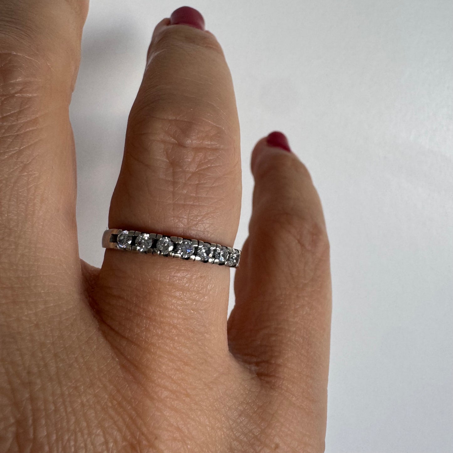 14K gold half eternity ring set with sparkling Diamonds.