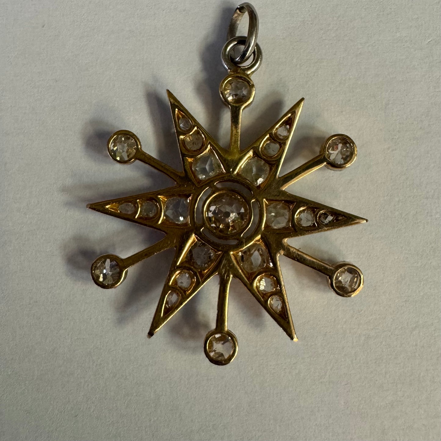 14K gold starburst pendant set with old- cut Diamonds