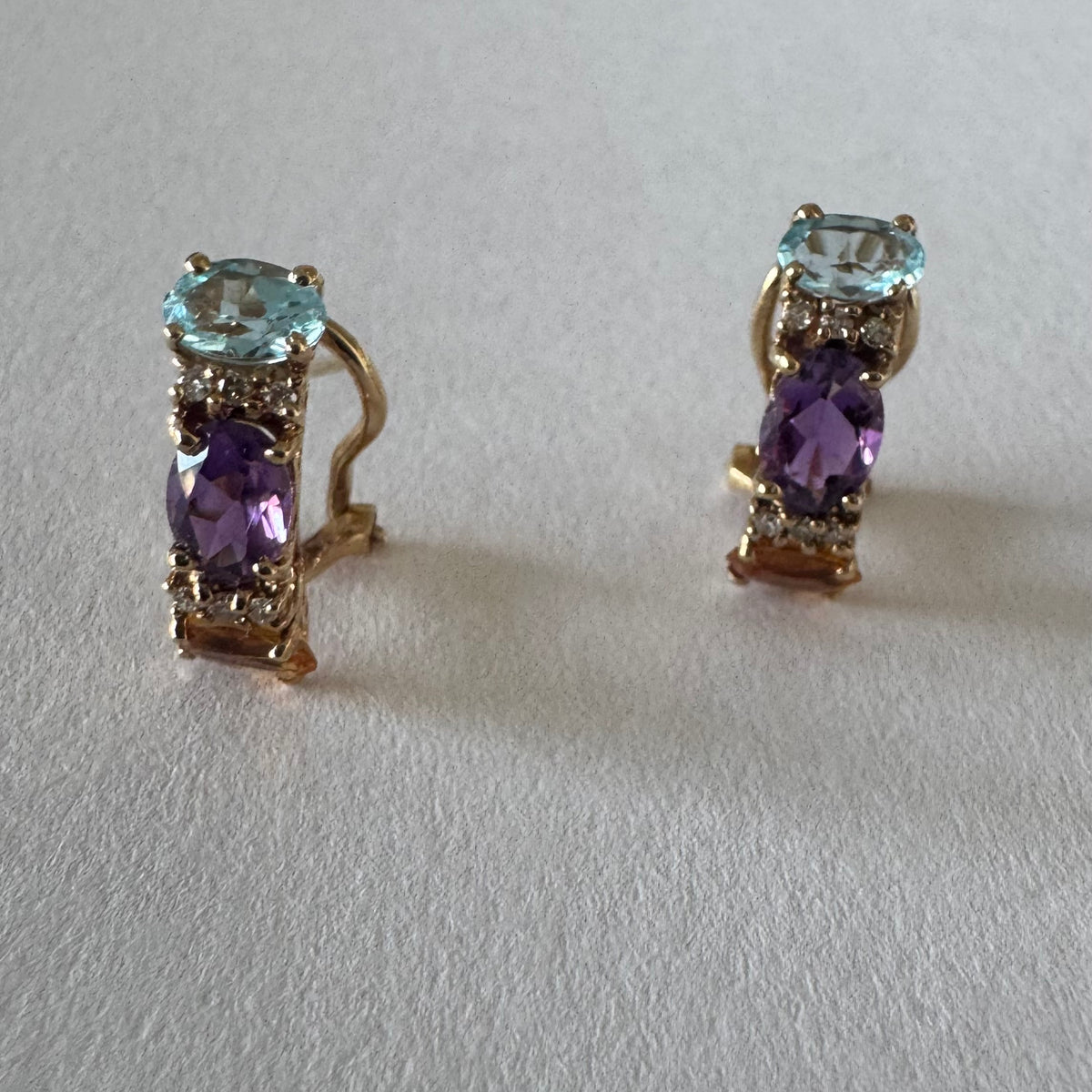 14K gold earrings featuring a beautiful arrangement of multi-colored gemstones & Diamonds