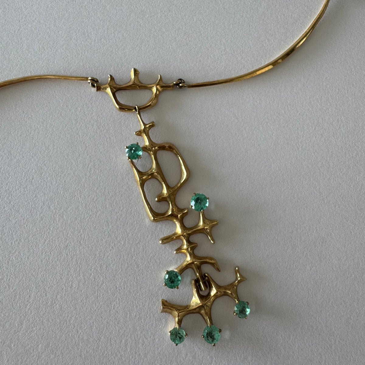 18K Gold Emerald Necklace with a Sculptural Design