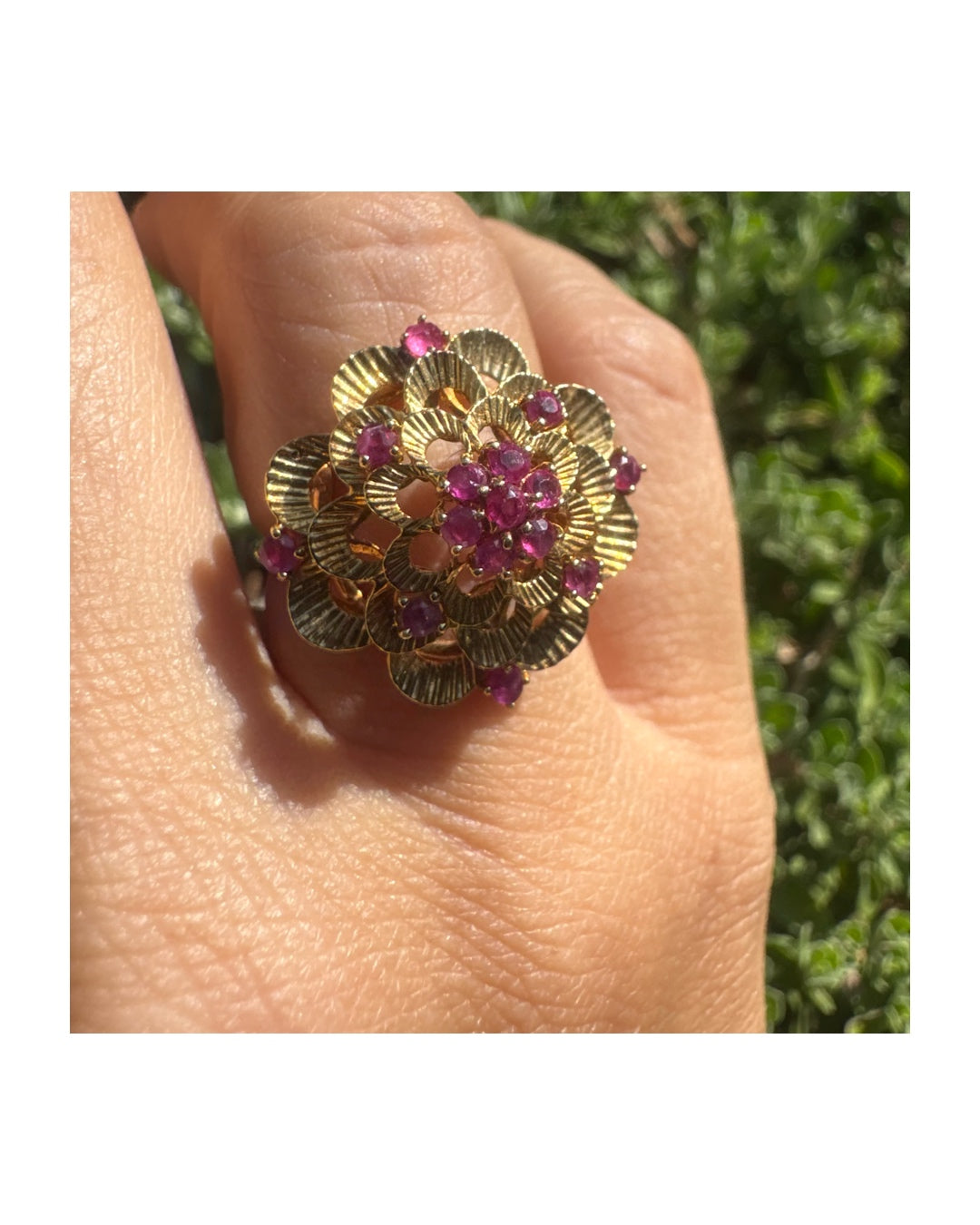 18K gold ring crafted in yellow gold, designed in a layered floral motif set with Rubies