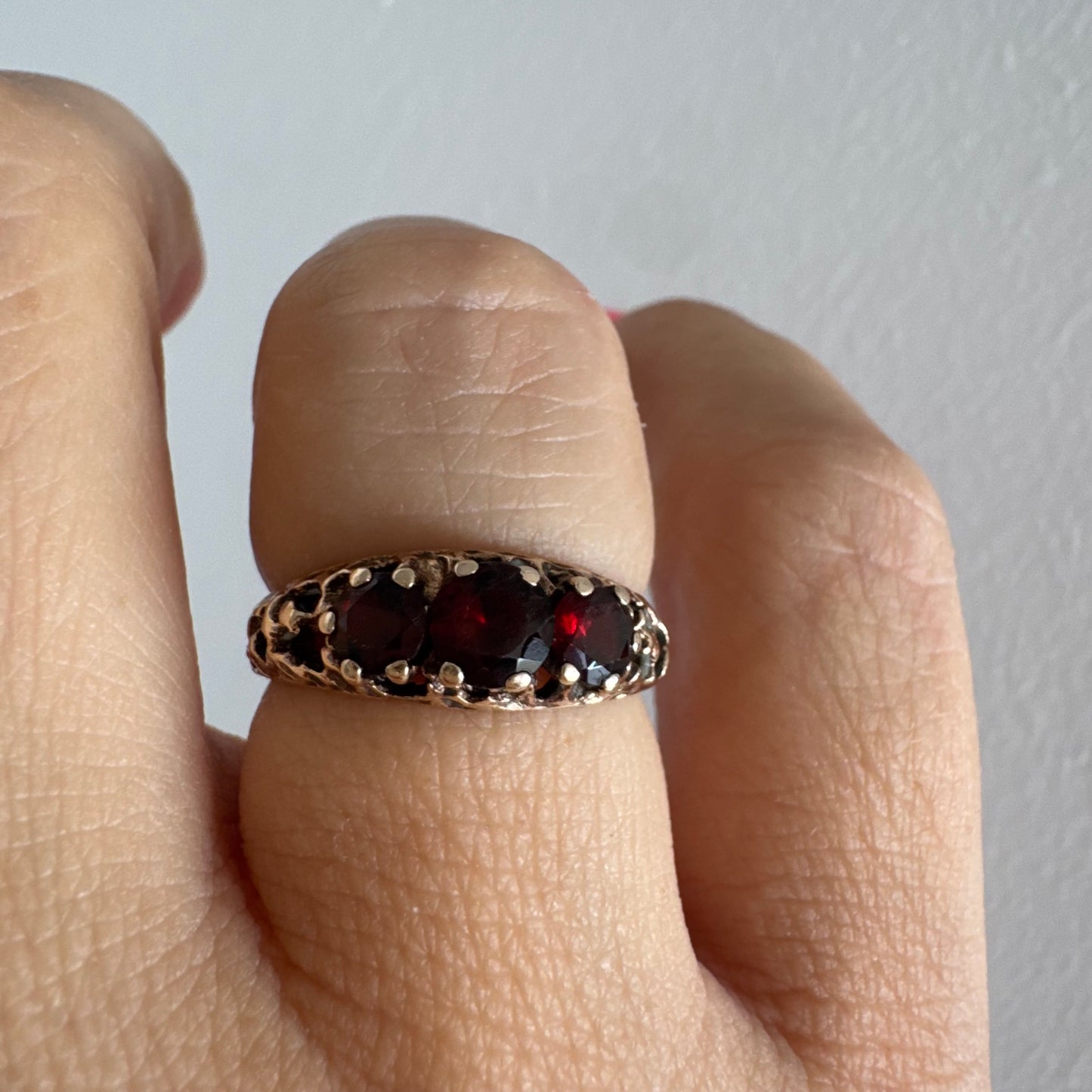 9K gold ring set with deep red Garnet stones