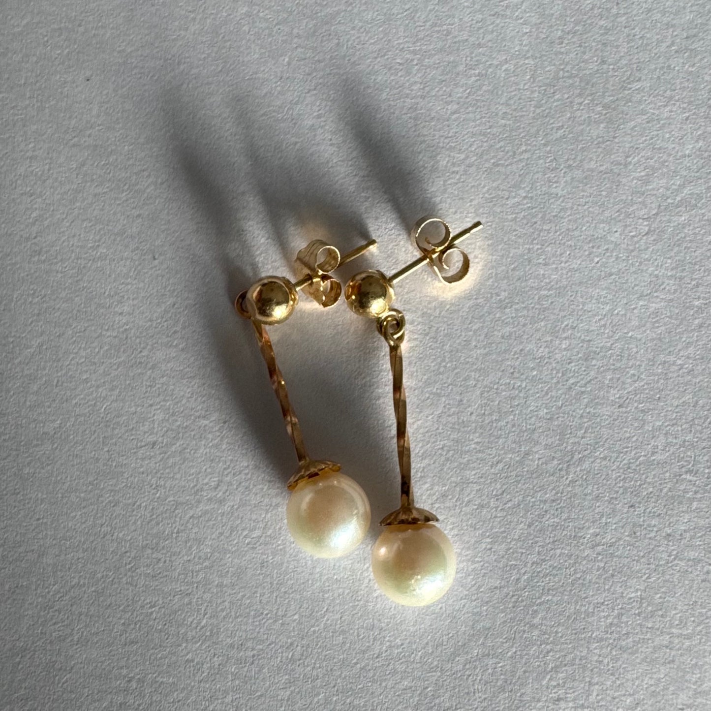 14K gold earrings set with Pearl