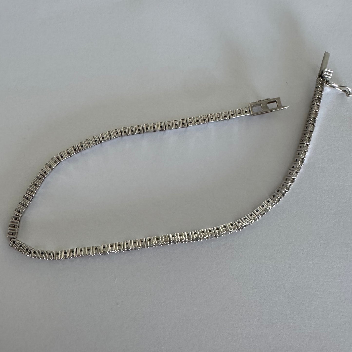 14K gold diamond bracelet with a sleek & elegant design.