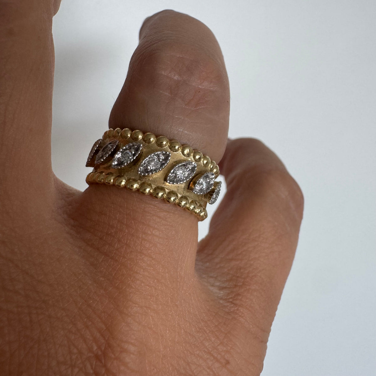 14K Yellow Gold Diamond Ring with a Wide Design