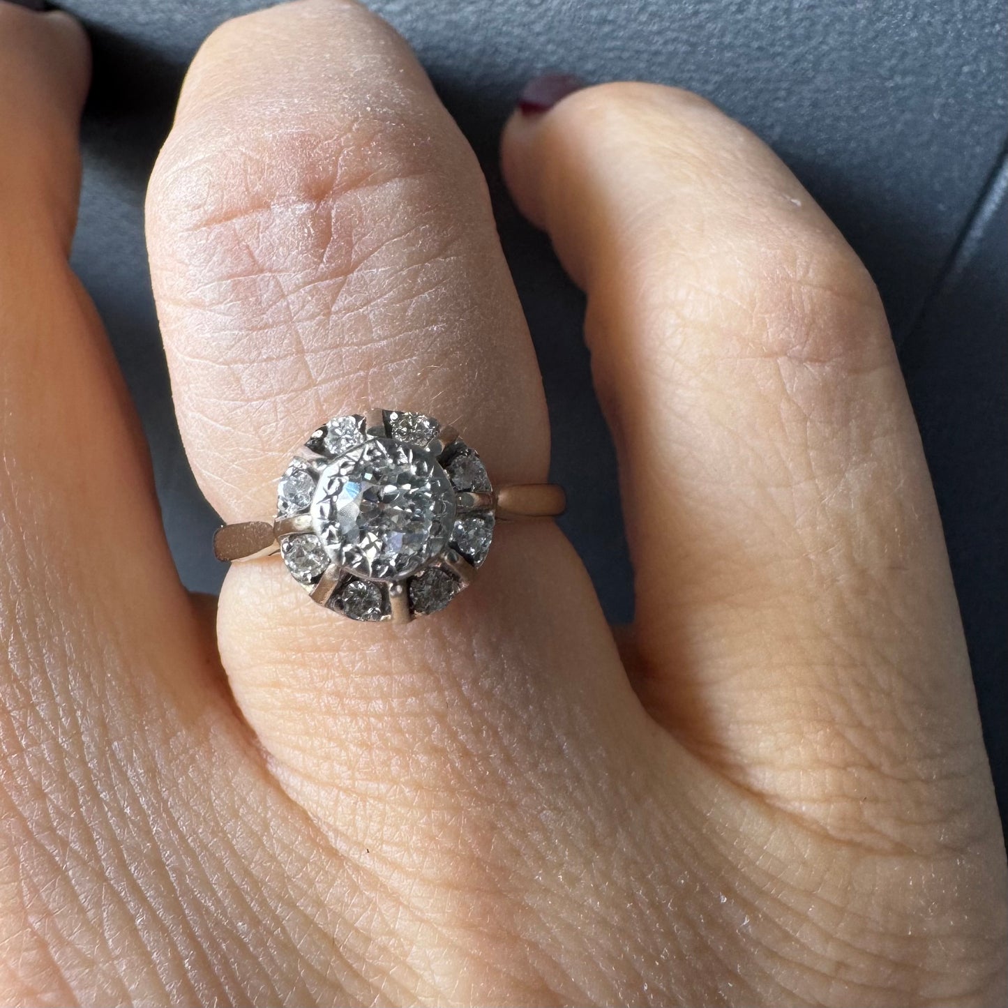 18K gold ring set with Diamonds in     a classic cluster-style