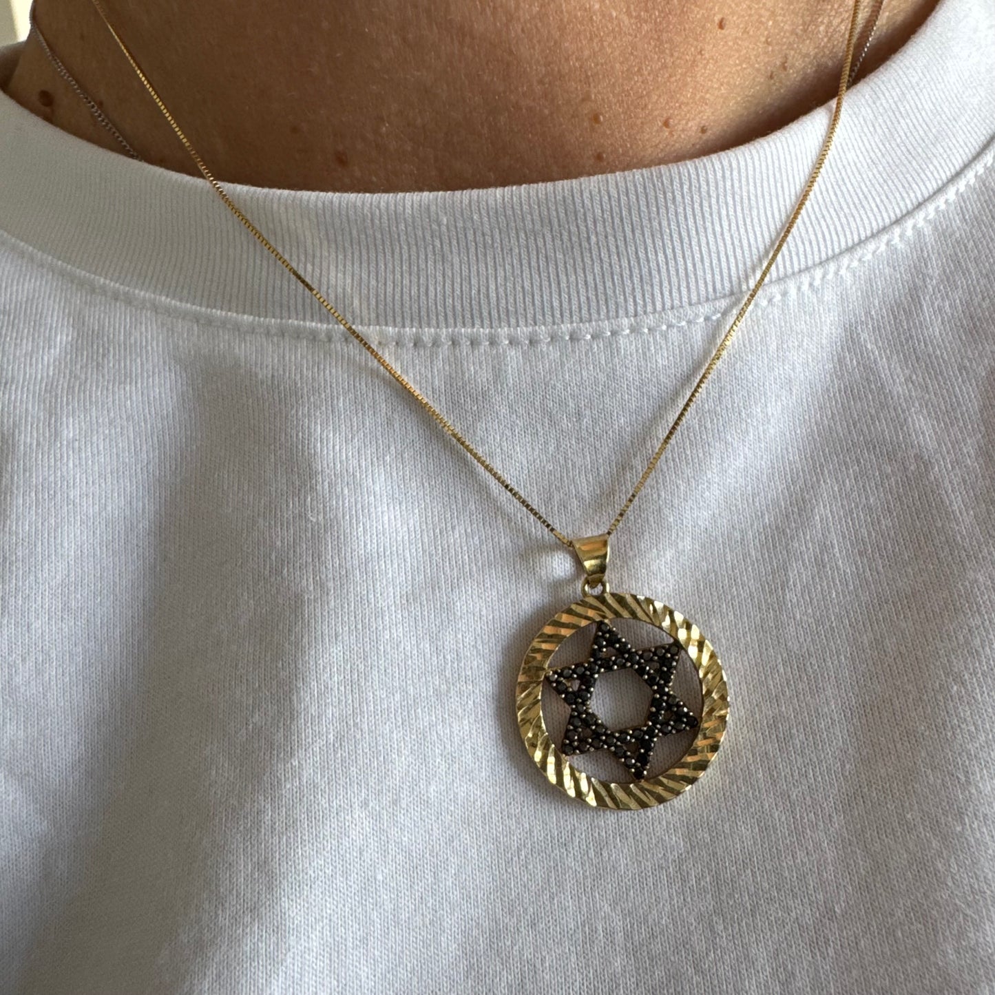 14K gold Star of David pendant set with Black Diamonds