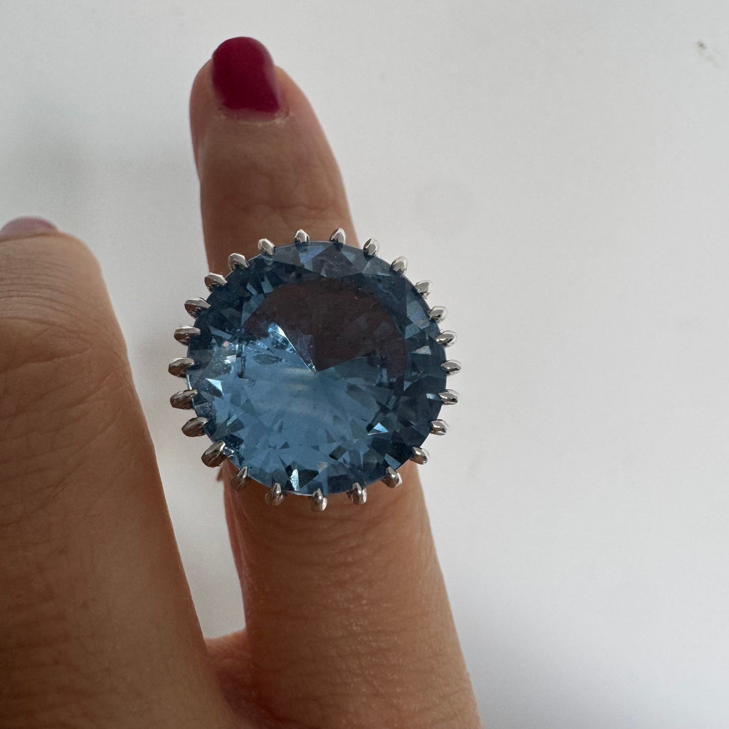 14K gold statement ring set with a large Blue Topaz stone