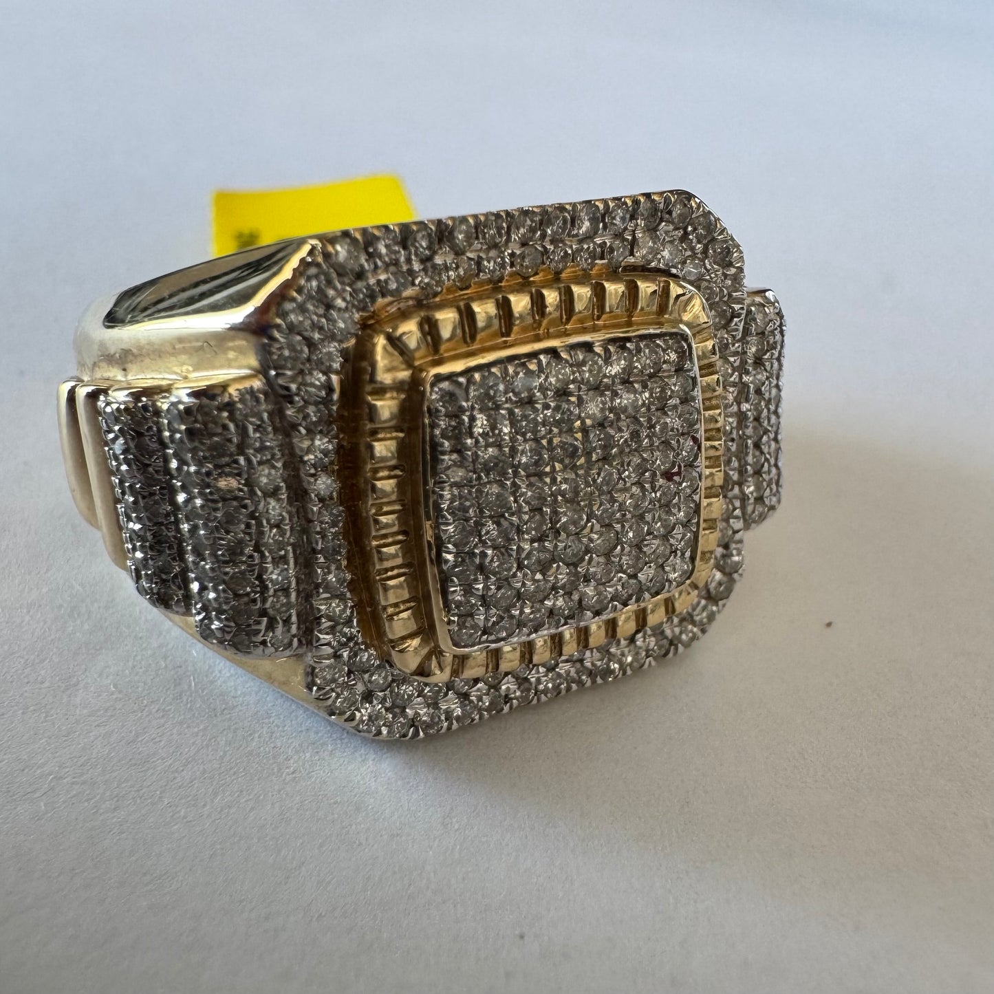10K gold ring set with sparkling Diamonds in a bold geometric design.
