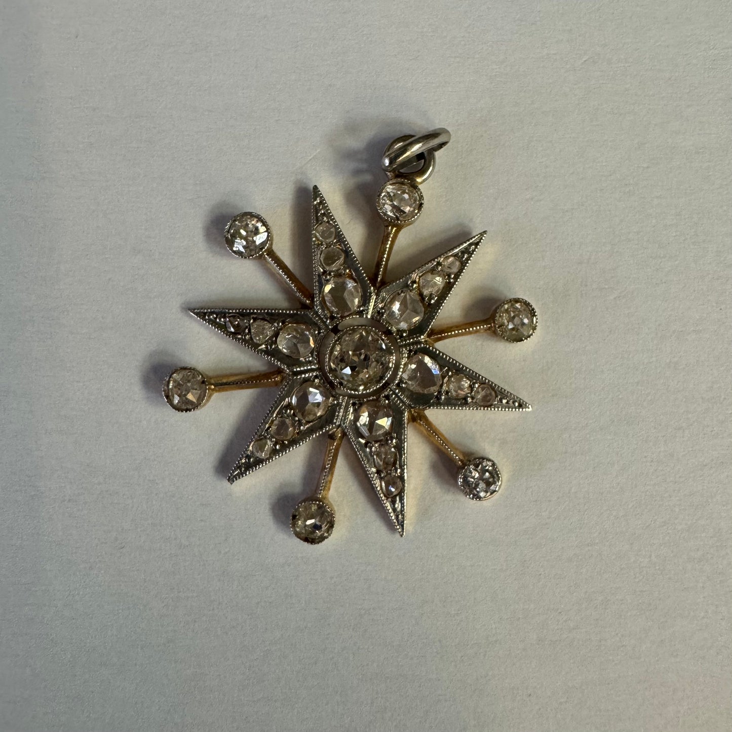 14K gold starburst pendant set with old- cut Diamonds