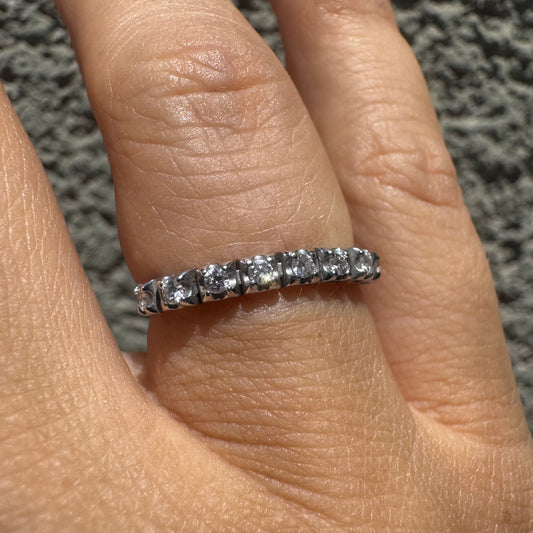 14K gold ring set with a row of sparkling Diamonds