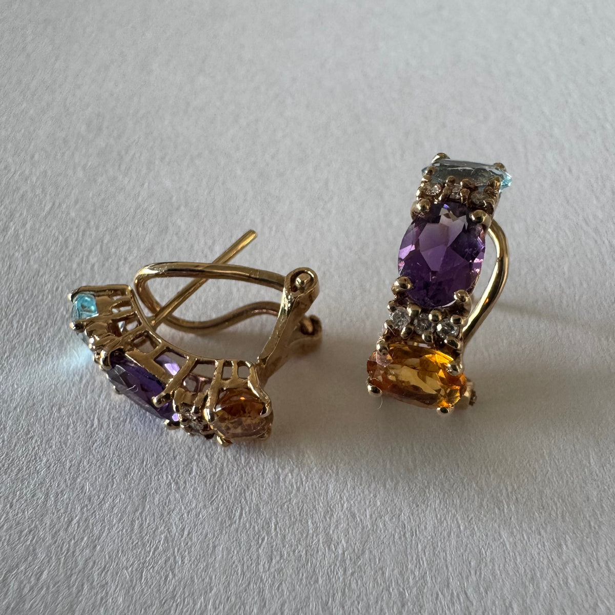 14K gold earrings featuring a beautiful arrangement of multi-colored gemstones & Diamonds