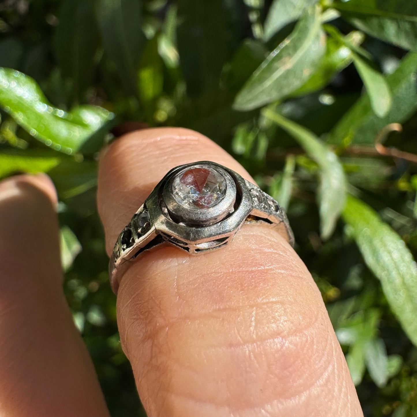 14K gold ring set with one center Diamond and side Diamonds