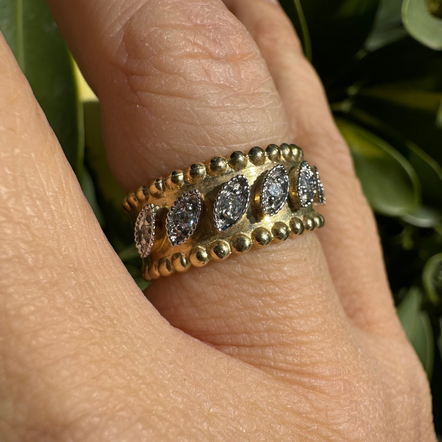 14K gold ring set with Diamonds