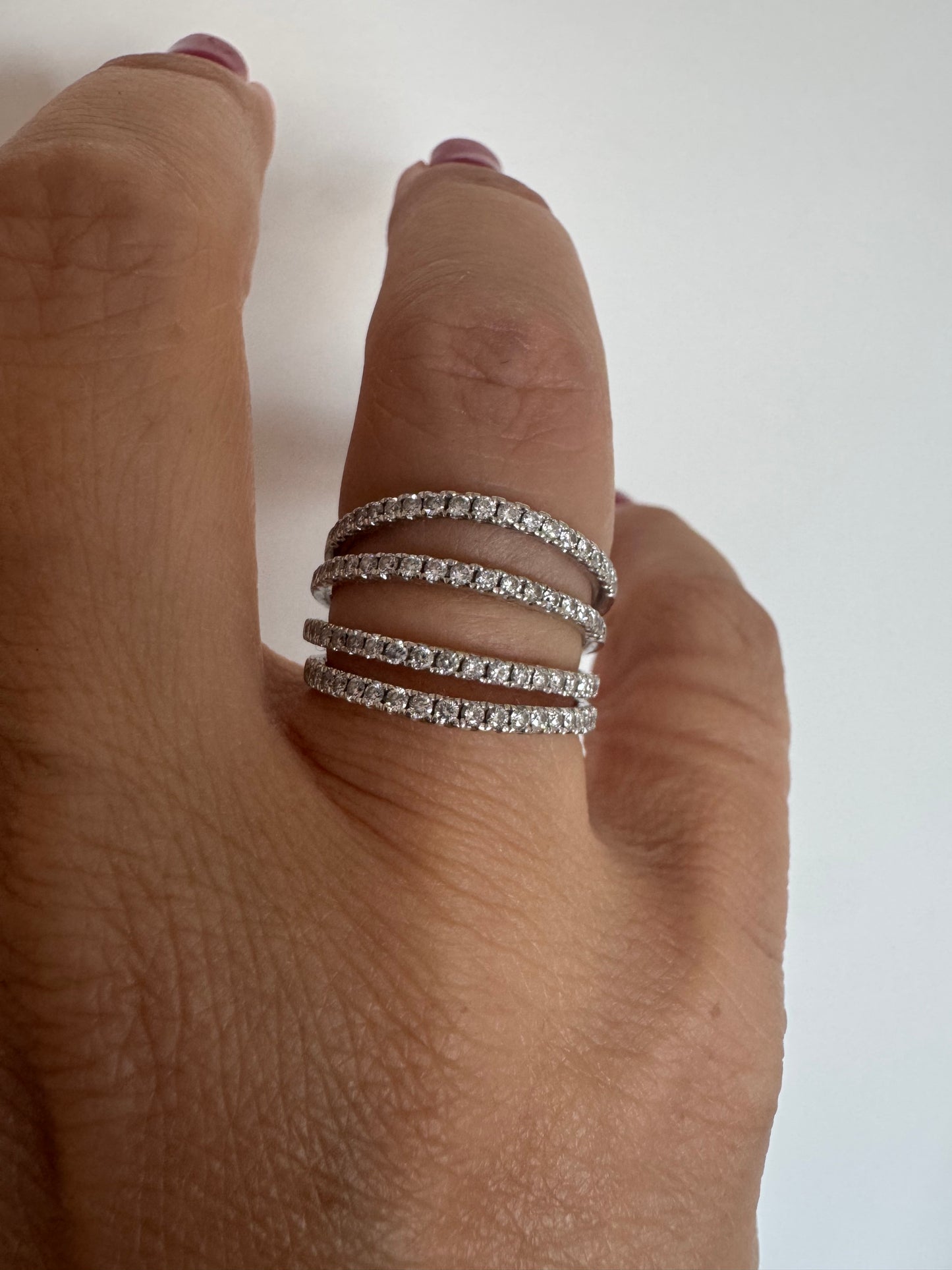 14K gold ring designed with multiple rows of sparkling Diamonds