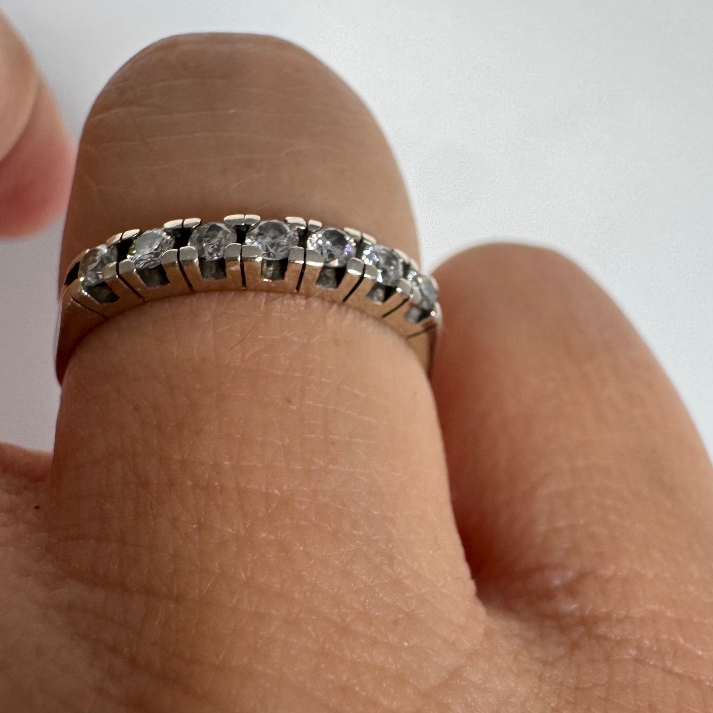 14K gold half eternity ring set with sparkling Diamonds.