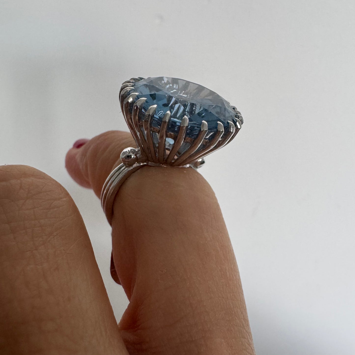 14K gold statement ring set with a large Blue Topaz stone