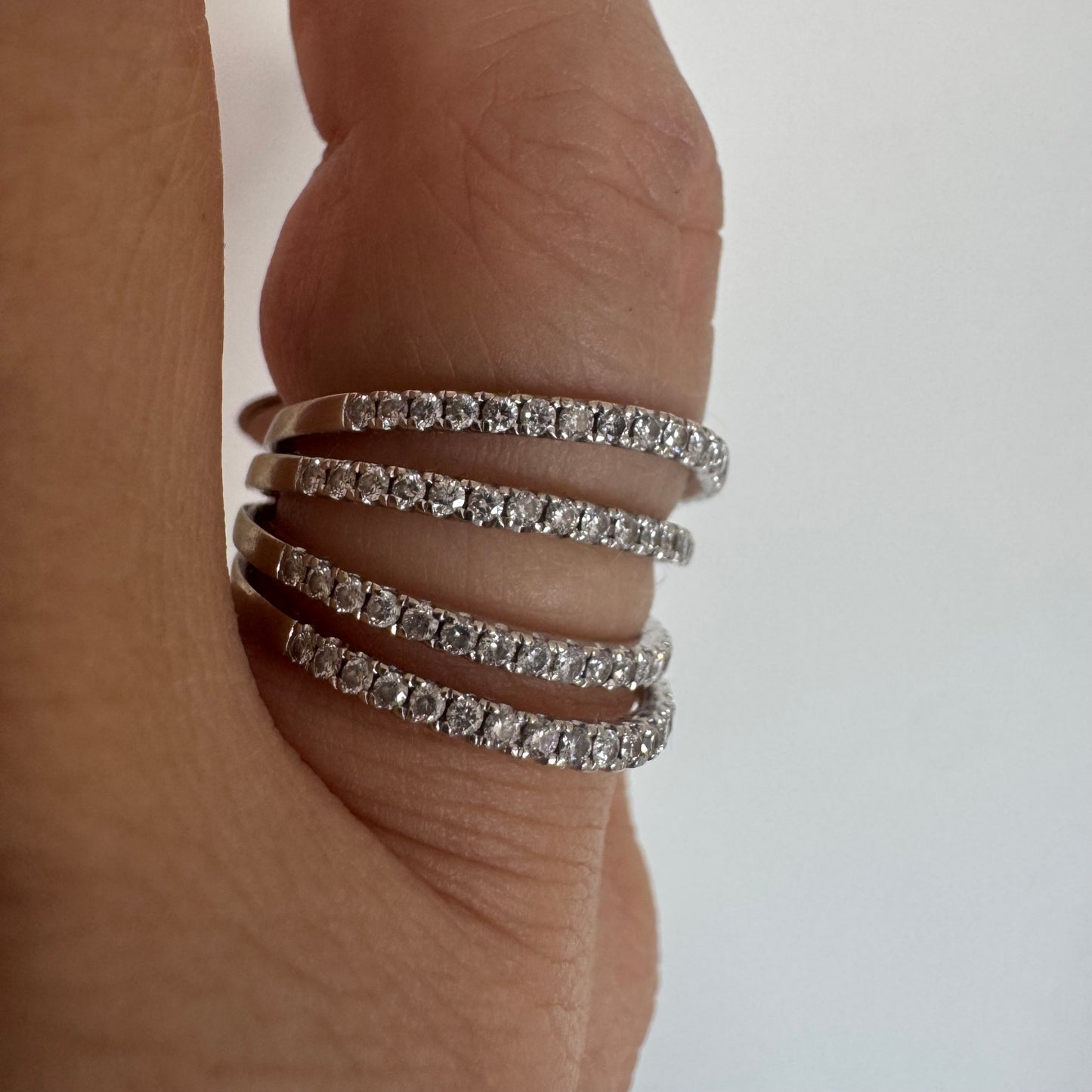 14K gold ring designed with multiple rows of sparkling Diamonds