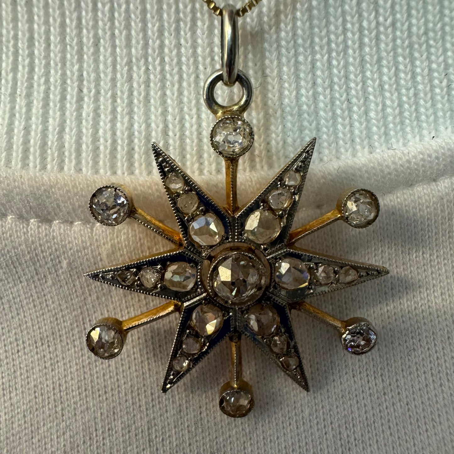 14K gold starburst pendant set with old- cut Diamonds