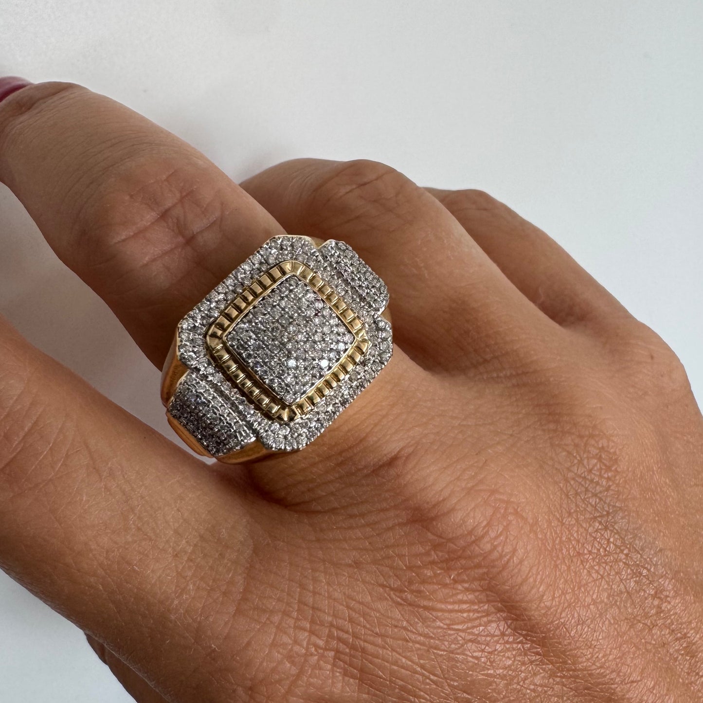 10K gold ring set with sparkling Diamonds in a bold geometric design.