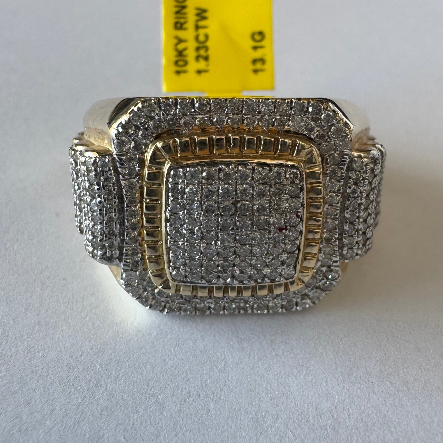 10K gold ring set with sparkling Diamonds in a bold geometric design.