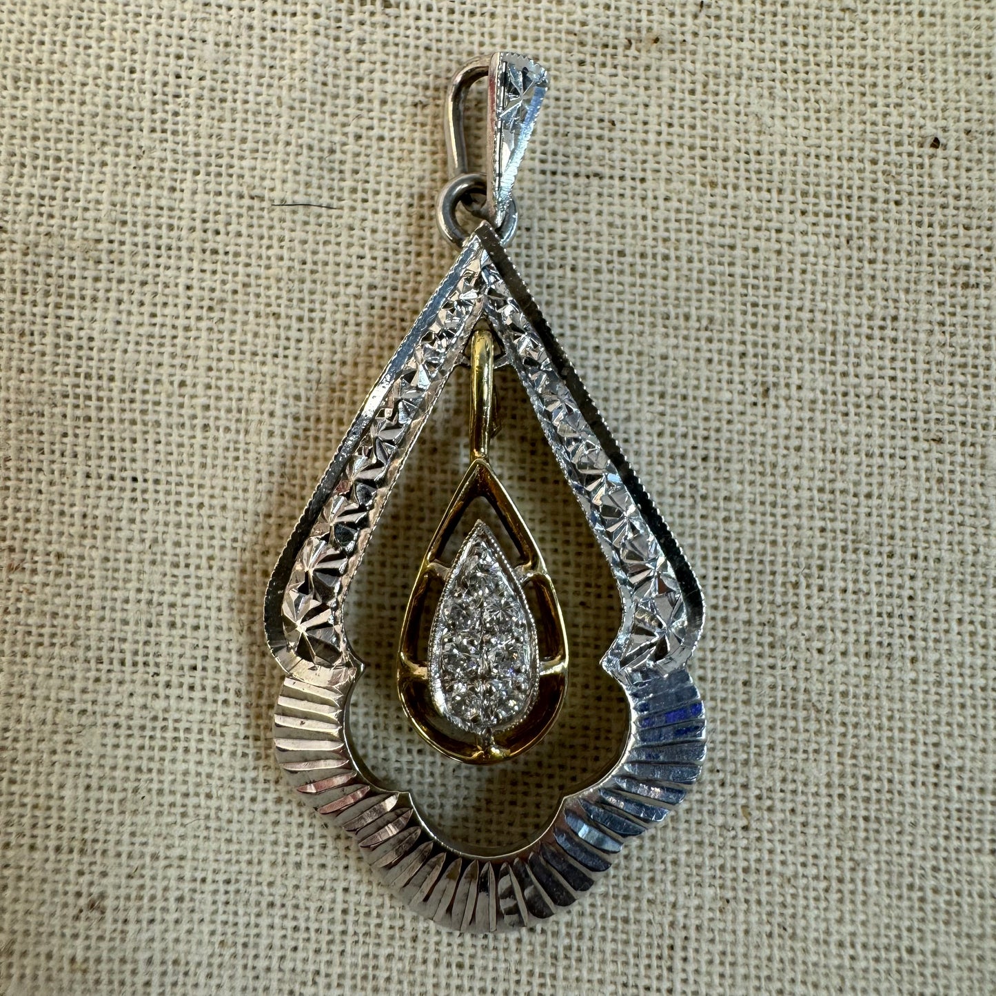 14K gold pendant set with Diamonds