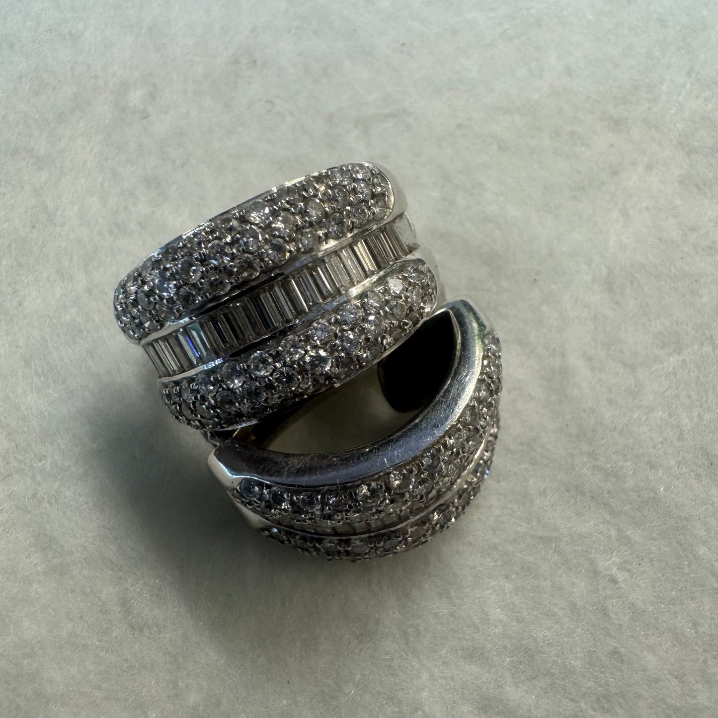 18K gold earrings set with baguette and pavé Diamonds.
