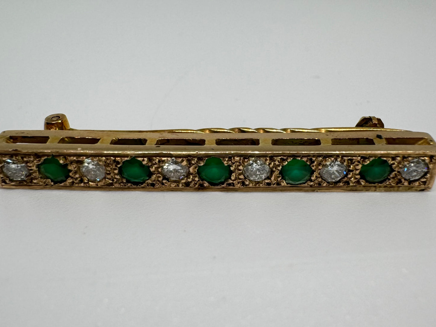 14K gold pin set with Emerald & Diamonds