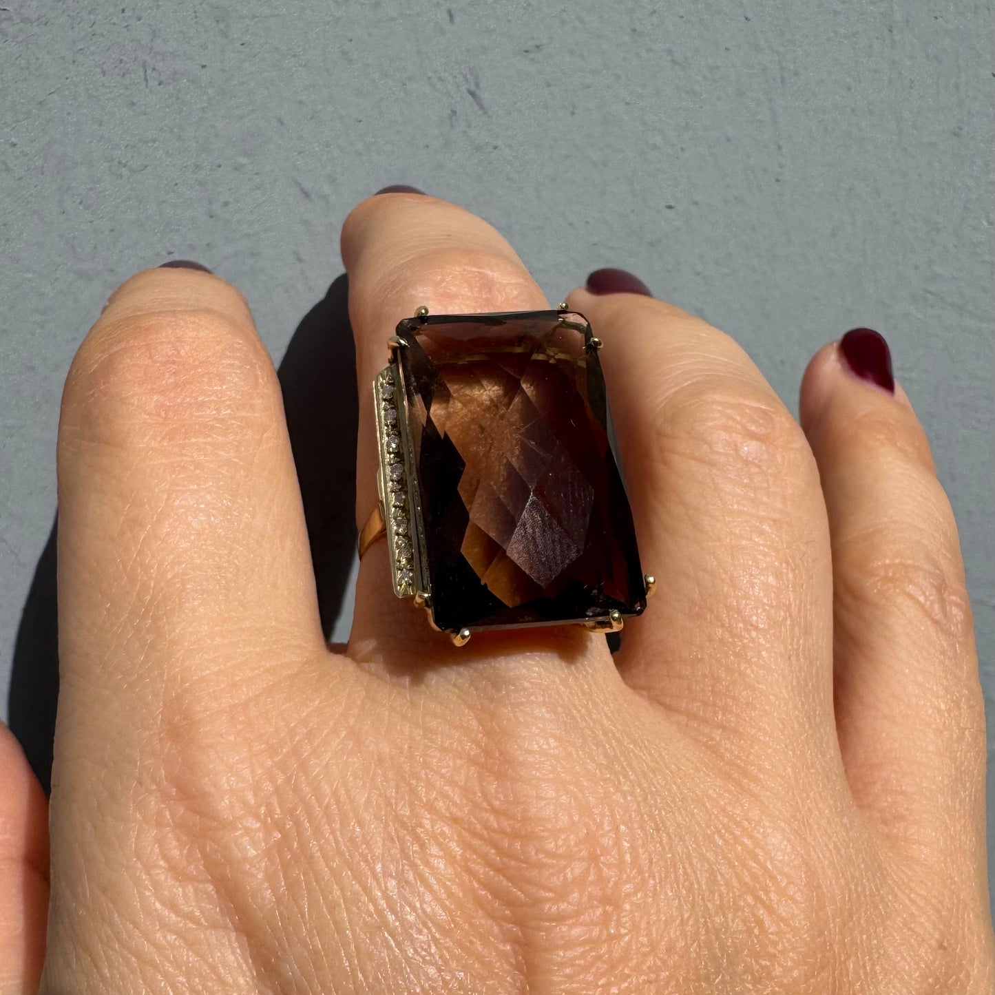 18K gold statement ring set with an oversized rectangular faceted Smoky Quartz center stone & Diamonds