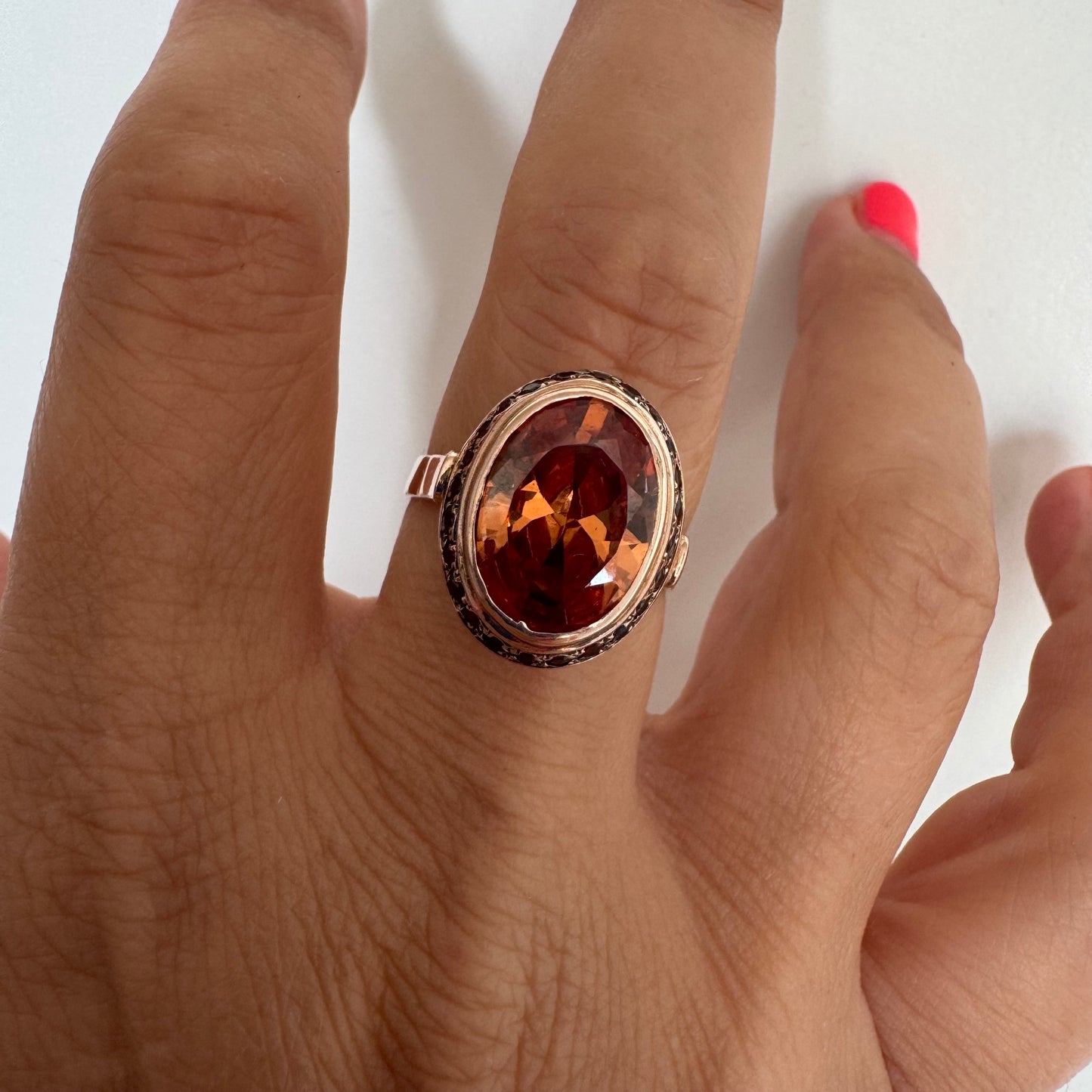 14K gold ring featuring a large cognac-toned Citrine, accented with delicate Ruby stones for a touch of rich color and contrast.