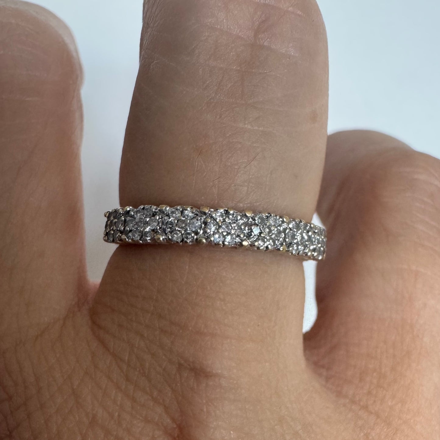 14K white gold half-eternity ring set with a row of Diamonds