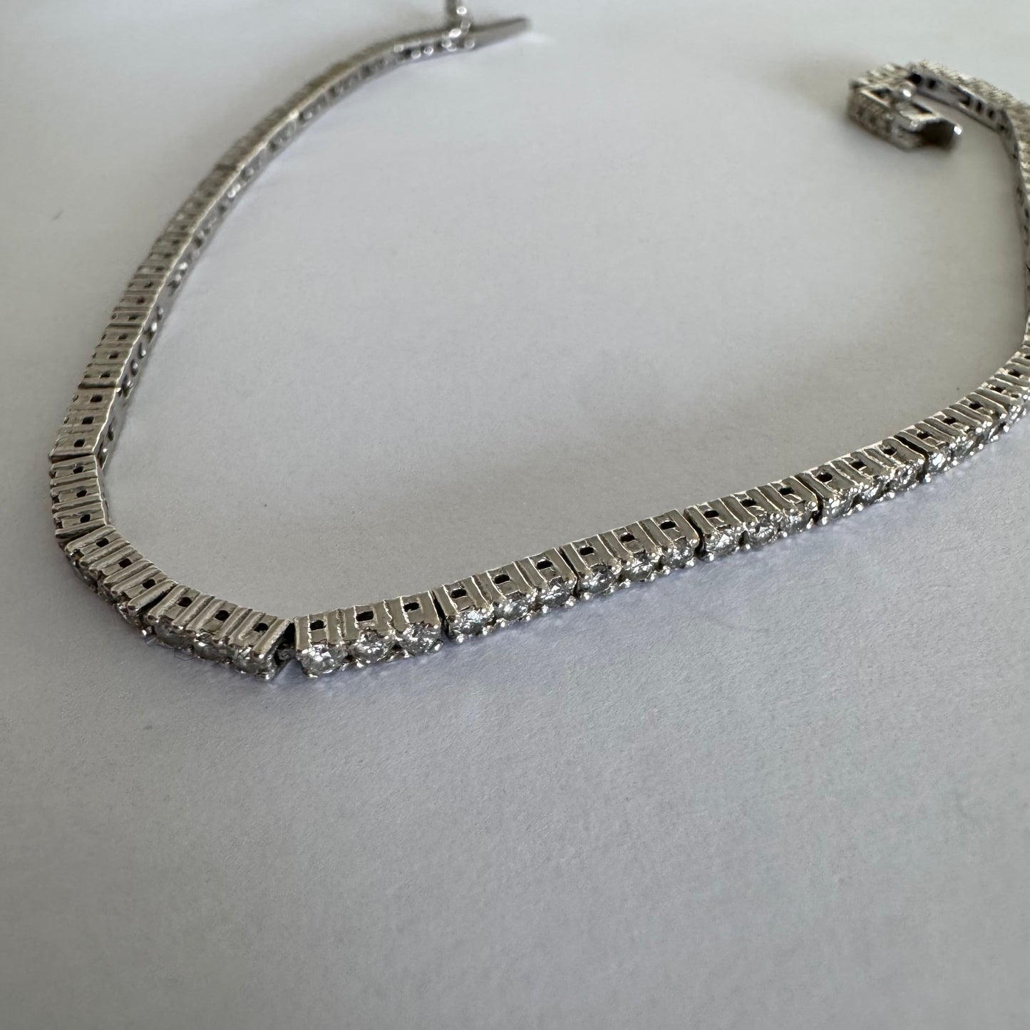 14K gold diamond bracelet with a sleek & elegant design.