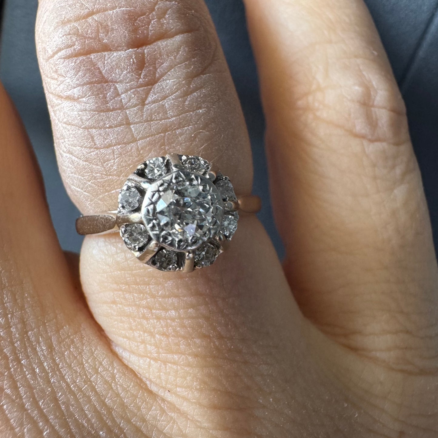 18K gold ring set with Diamonds in     a classic cluster-style