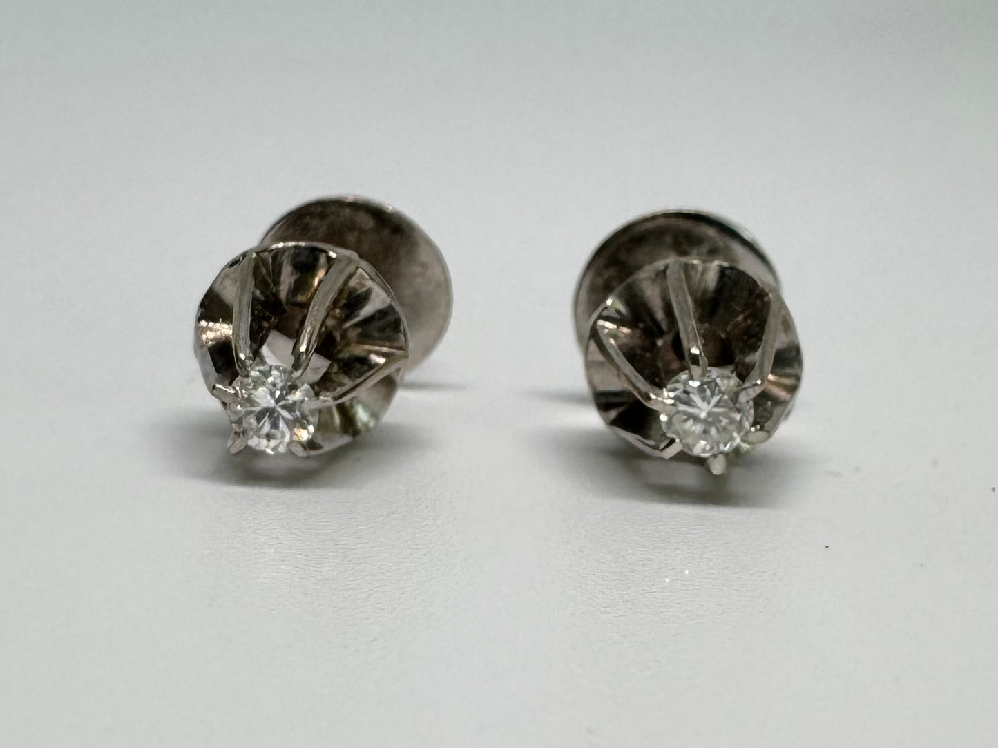 14K gold Stud Earrings set with One center Diamond