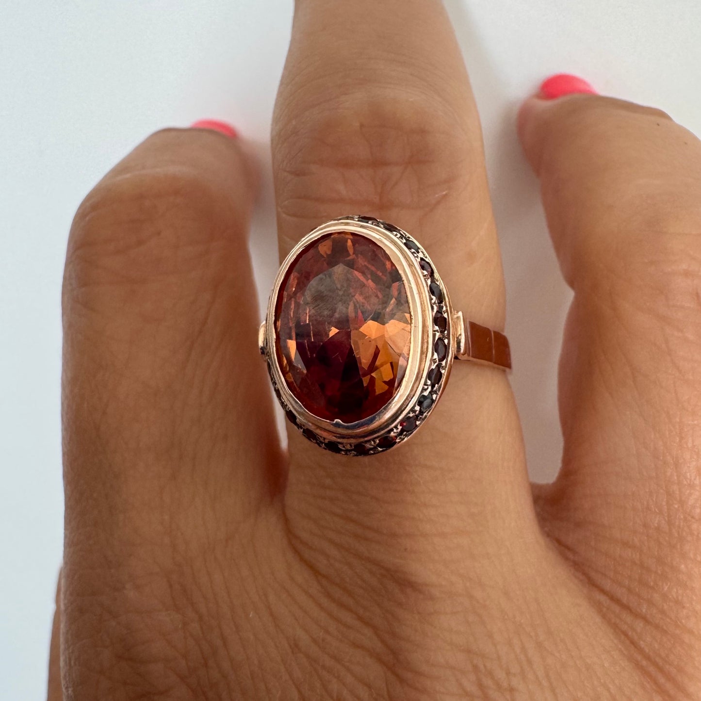 14K gold ring featuring a large cognac-toned Citrine, accented with delicate Ruby stones for a touch of rich color and contrast.