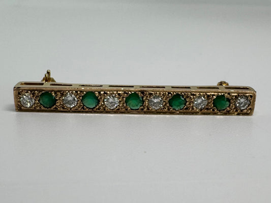 14K gold pin set with Emerald & Diamonds