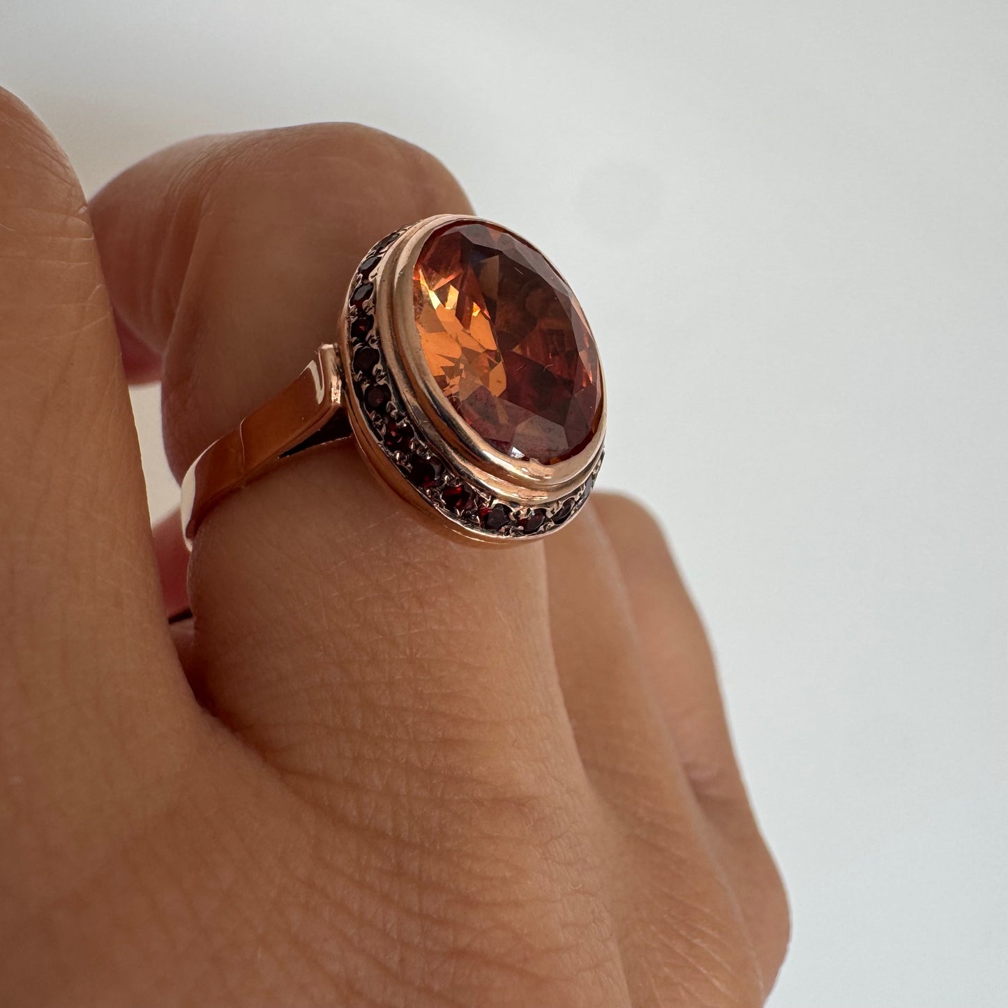 14K gold ring featuring a large cognac-toned Citrine, accented with delicate Ruby stones for a touch of rich color and contrast.