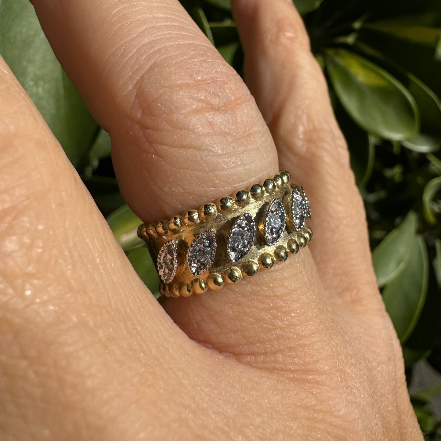 14K gold ring set with Diamonds