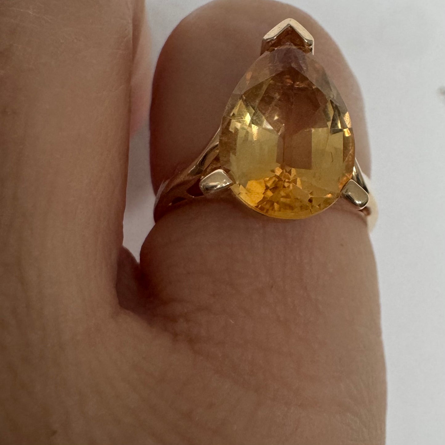 14K gold ring set with a large pear-shaped Citrine