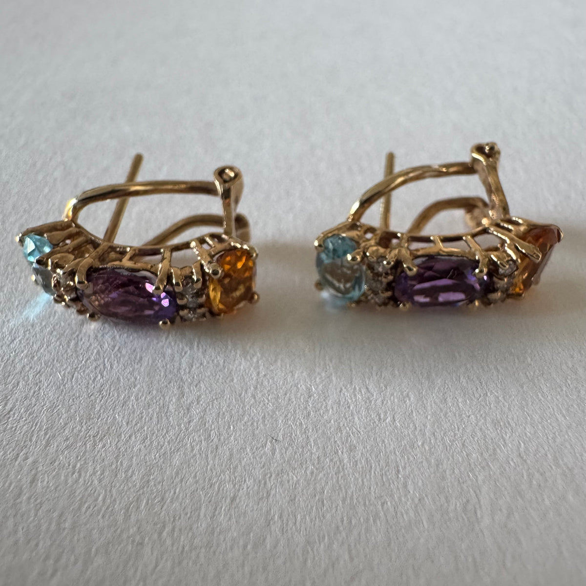14K gold earrings featuring a beautiful arrangement of multi-colored gemstones & Diamonds