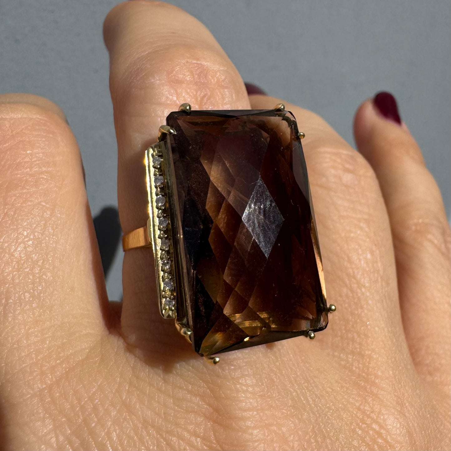 18K gold statement ring set with an oversized rectangular faceted Smoky Quartz center stone & Diamonds